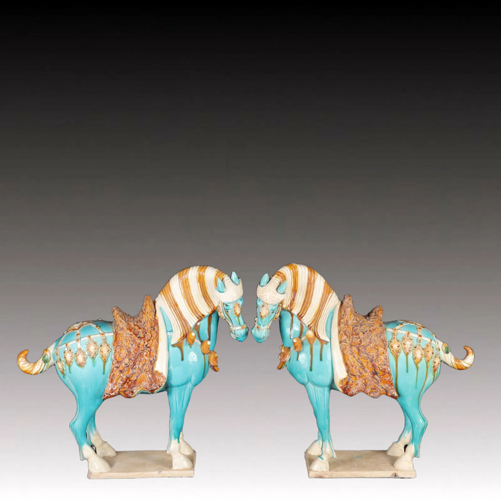A Pair of Rare Tang Tri-Color Glazed Pottery Horse Ornaments
