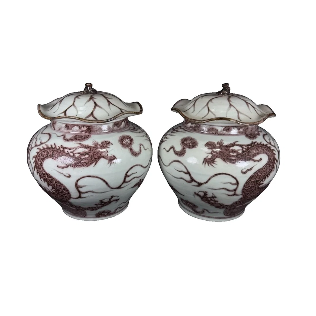 A pair of red dragon pattern lotus leaf covered jars from Yuan Dynasty.