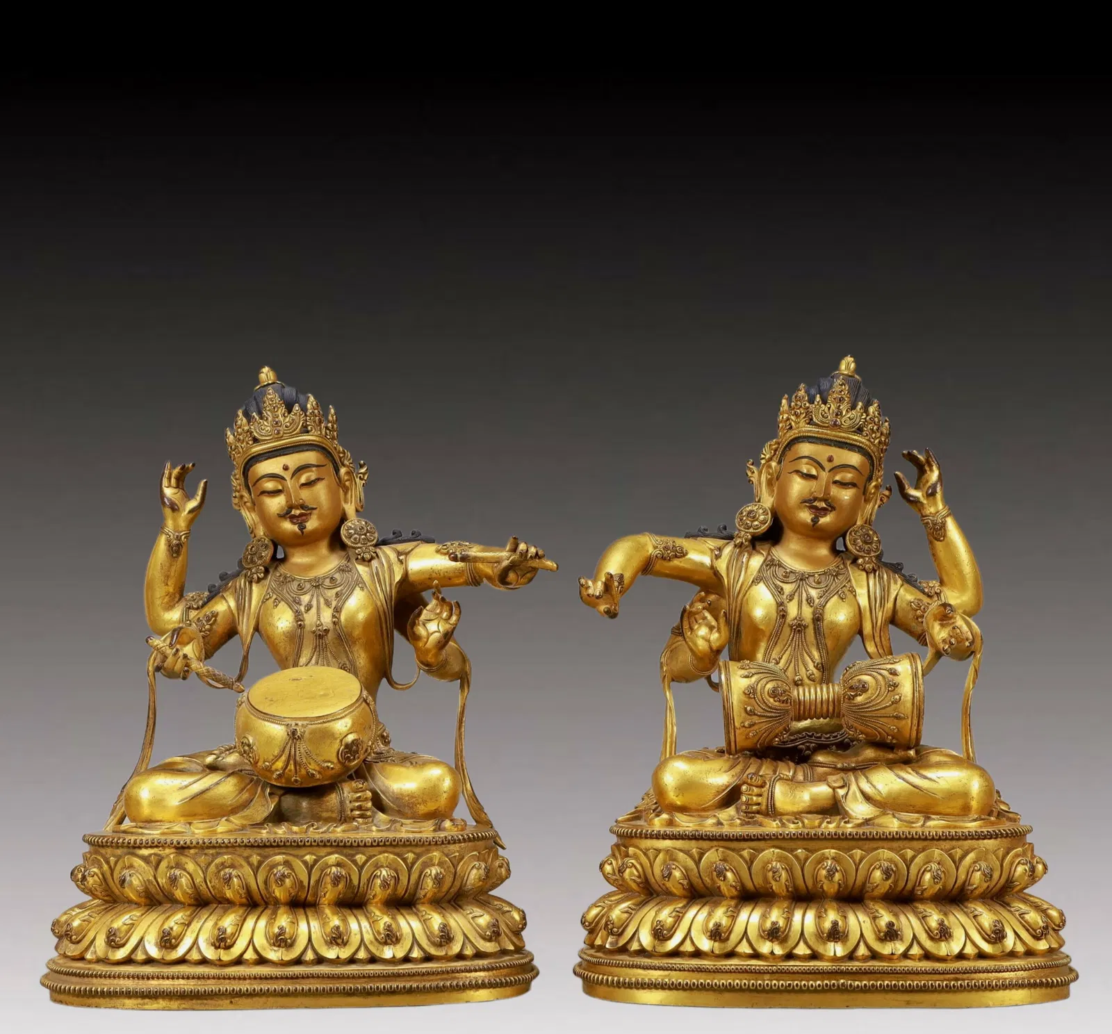 A Pair of Solemn Gilt Bronze Statue of Four-arms Guanyin