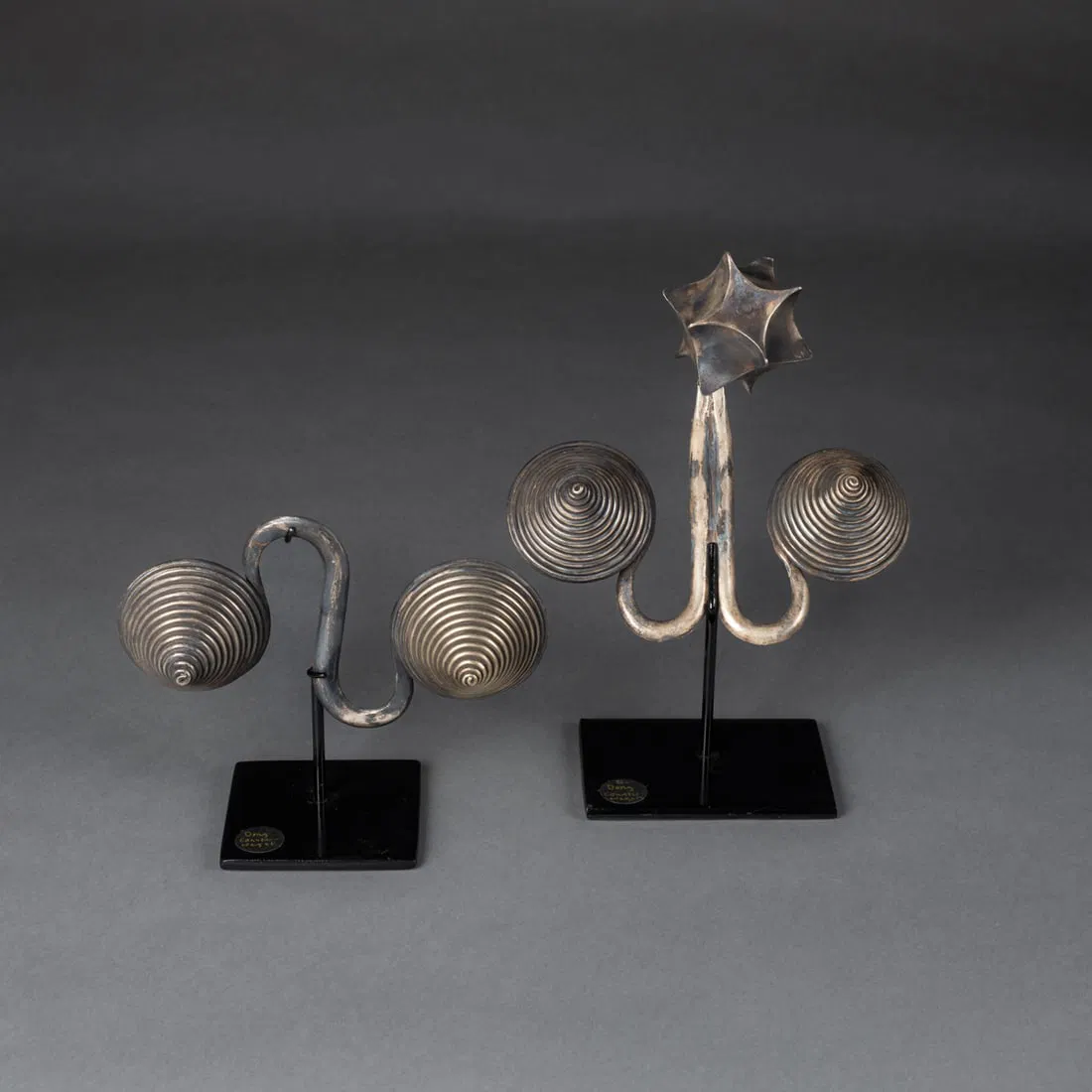 A pair of tribal Chinese neck weights