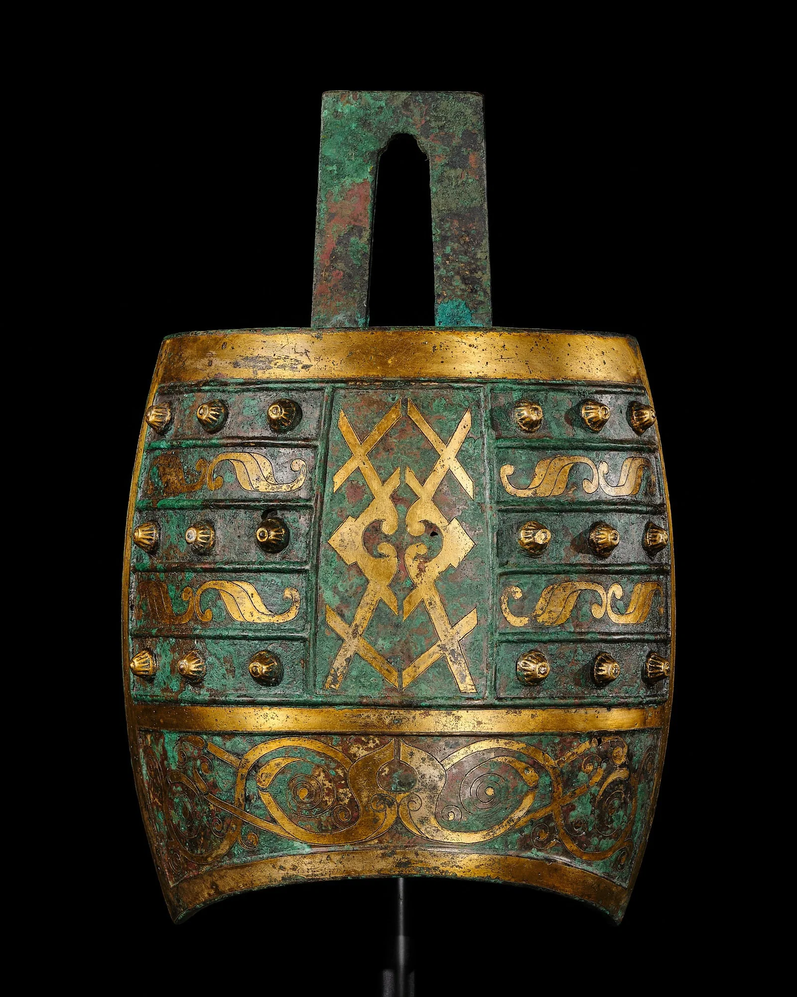 A PARCEL-GILT AND INCISED BRONZE BELL, NIUZHONG, WESTERN HAN DYNASTY