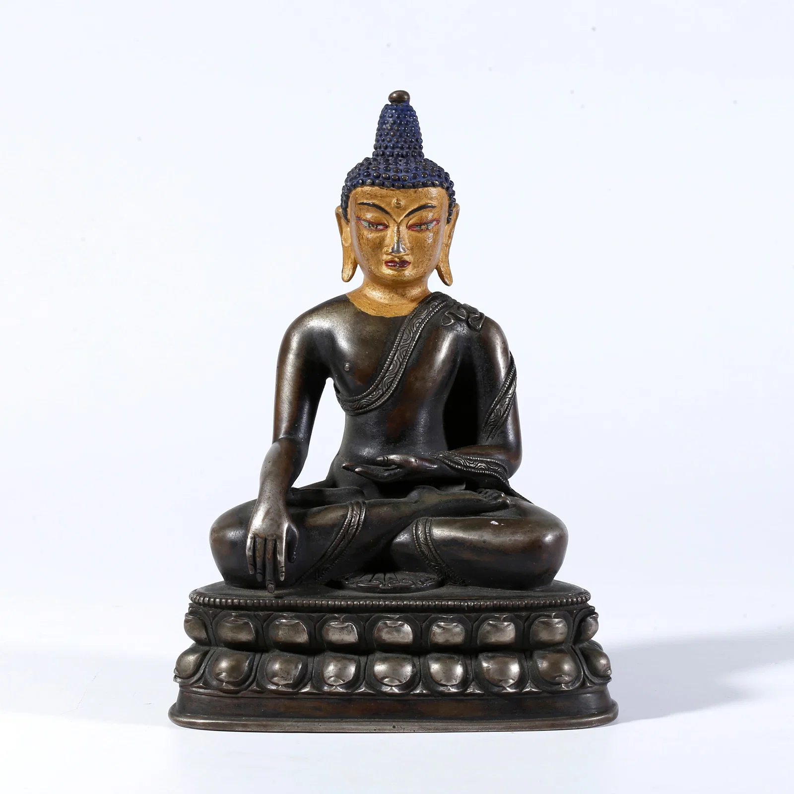 A PARTIAL GILT BRONZE STATUE OF SHAKYAMUNI