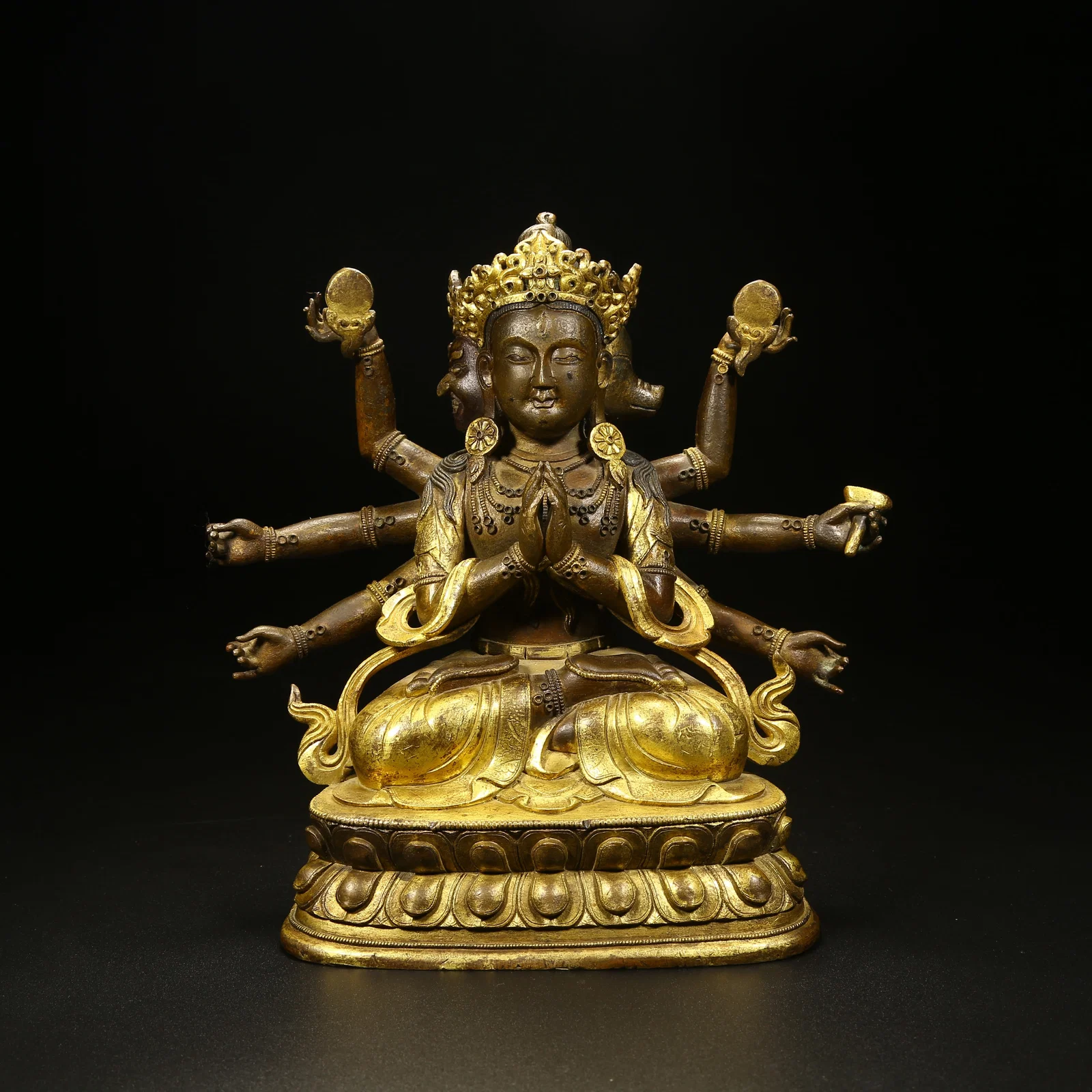A PARTIALLY GILT BRONZE FIGURE OF MARICHI