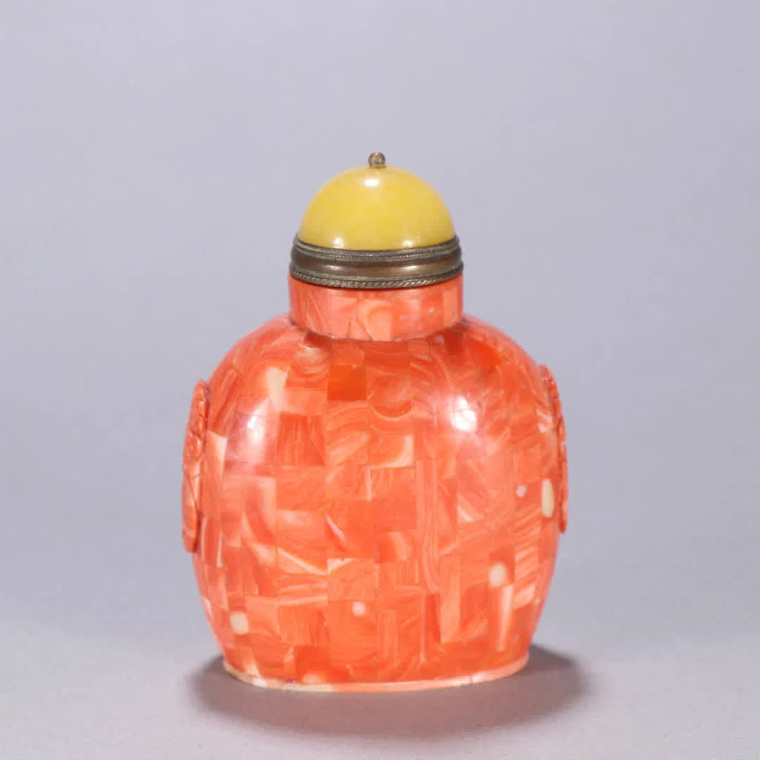 A piece of coral snuffbox