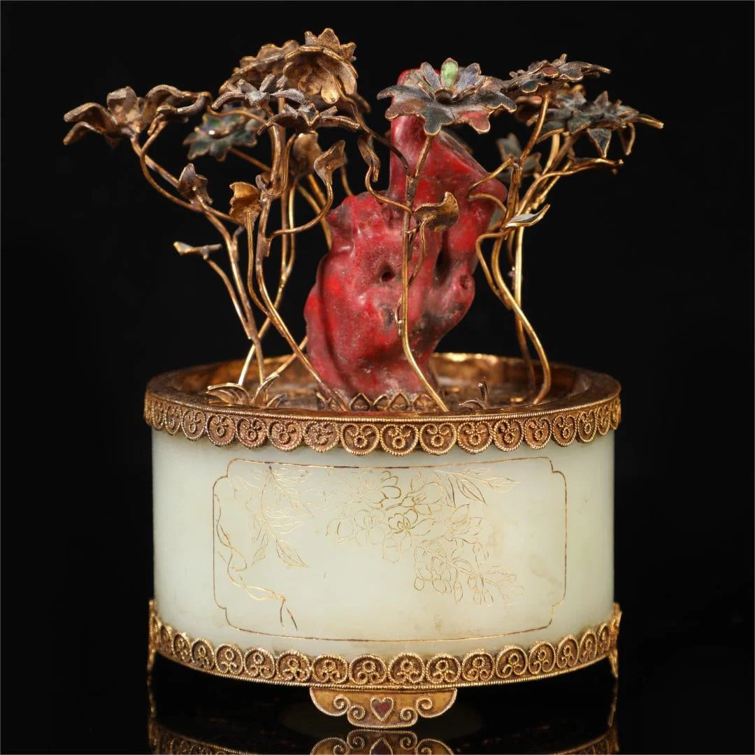 A piece of exquisite Hetian jade inlaid with silver gilt