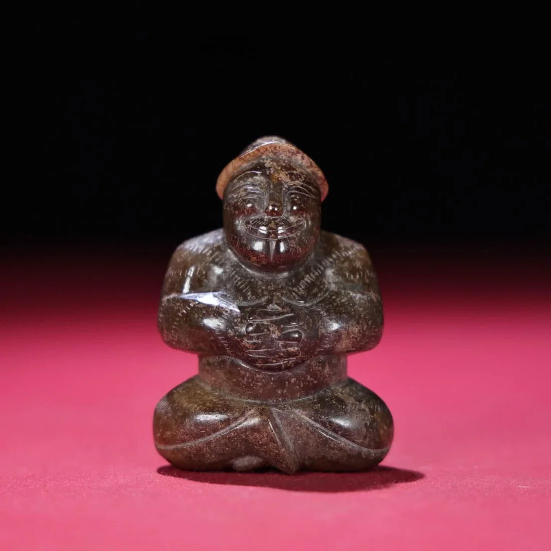 A piece of Han Dynasty jade kneeling