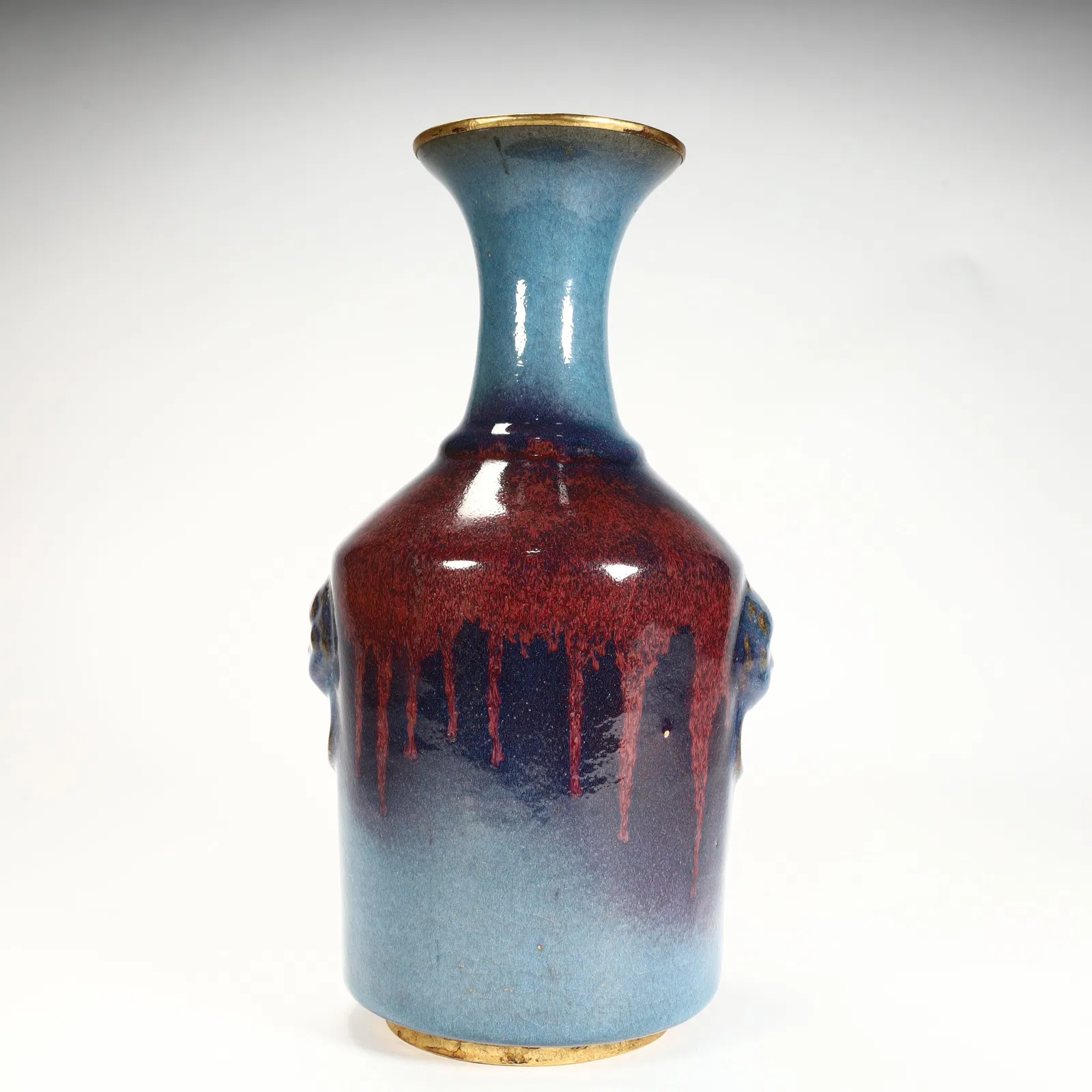A piece of Jun kiln kiln turned into a gilded beast ear bottle