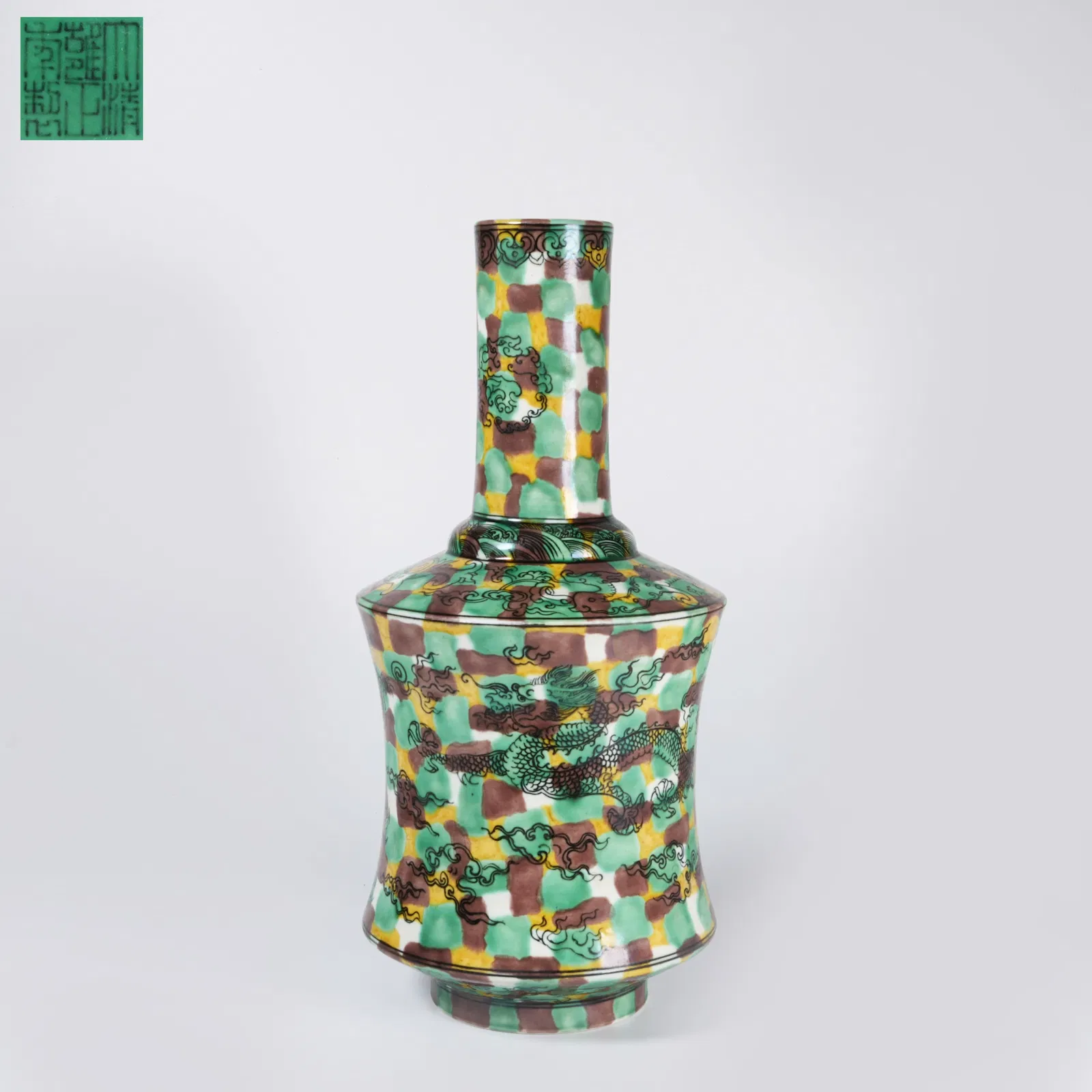 A PLAIN SANCAI "CLOUD AND DRAGON" REWARD VASE