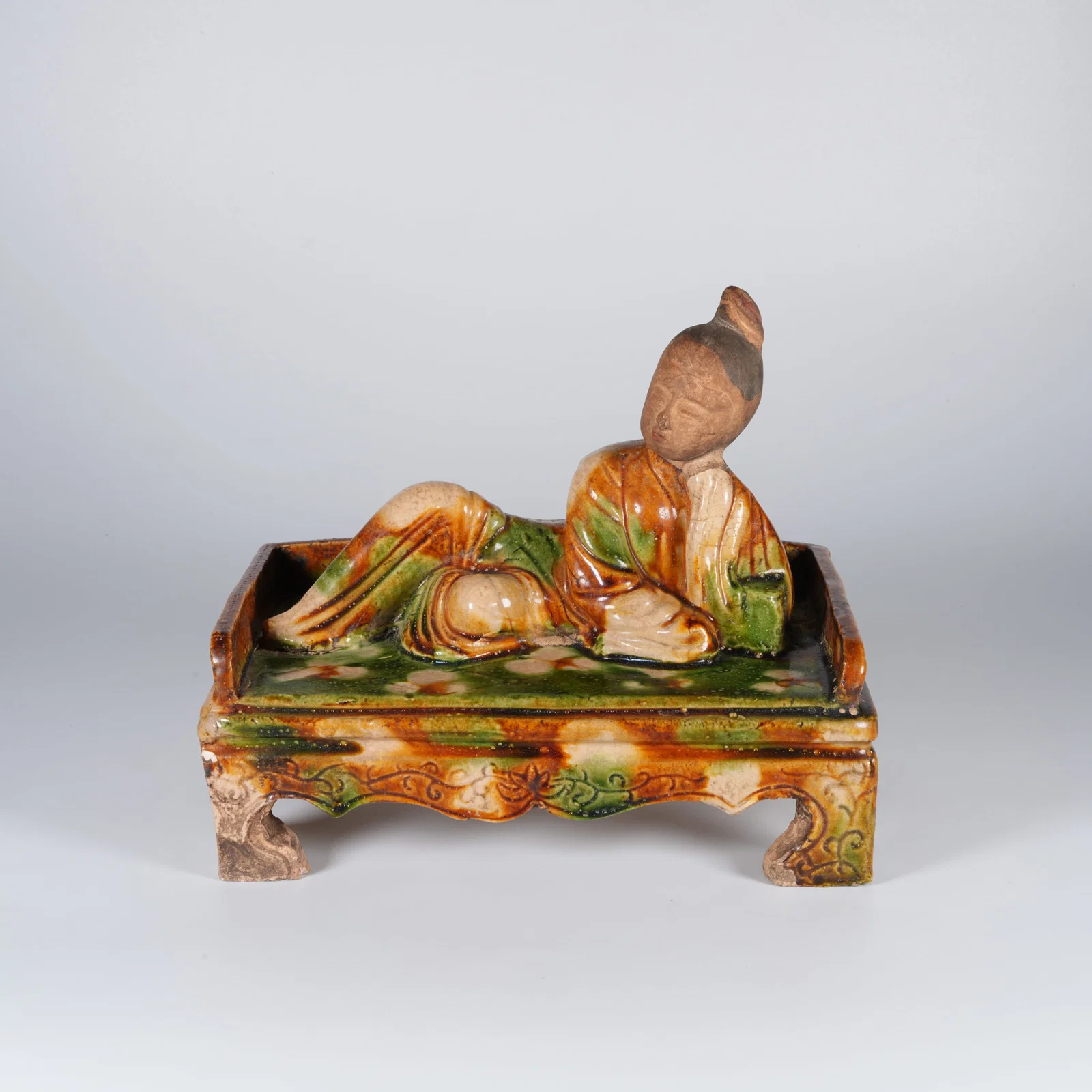 A PLAIN SANCAI GLAZED LADY FIGURE