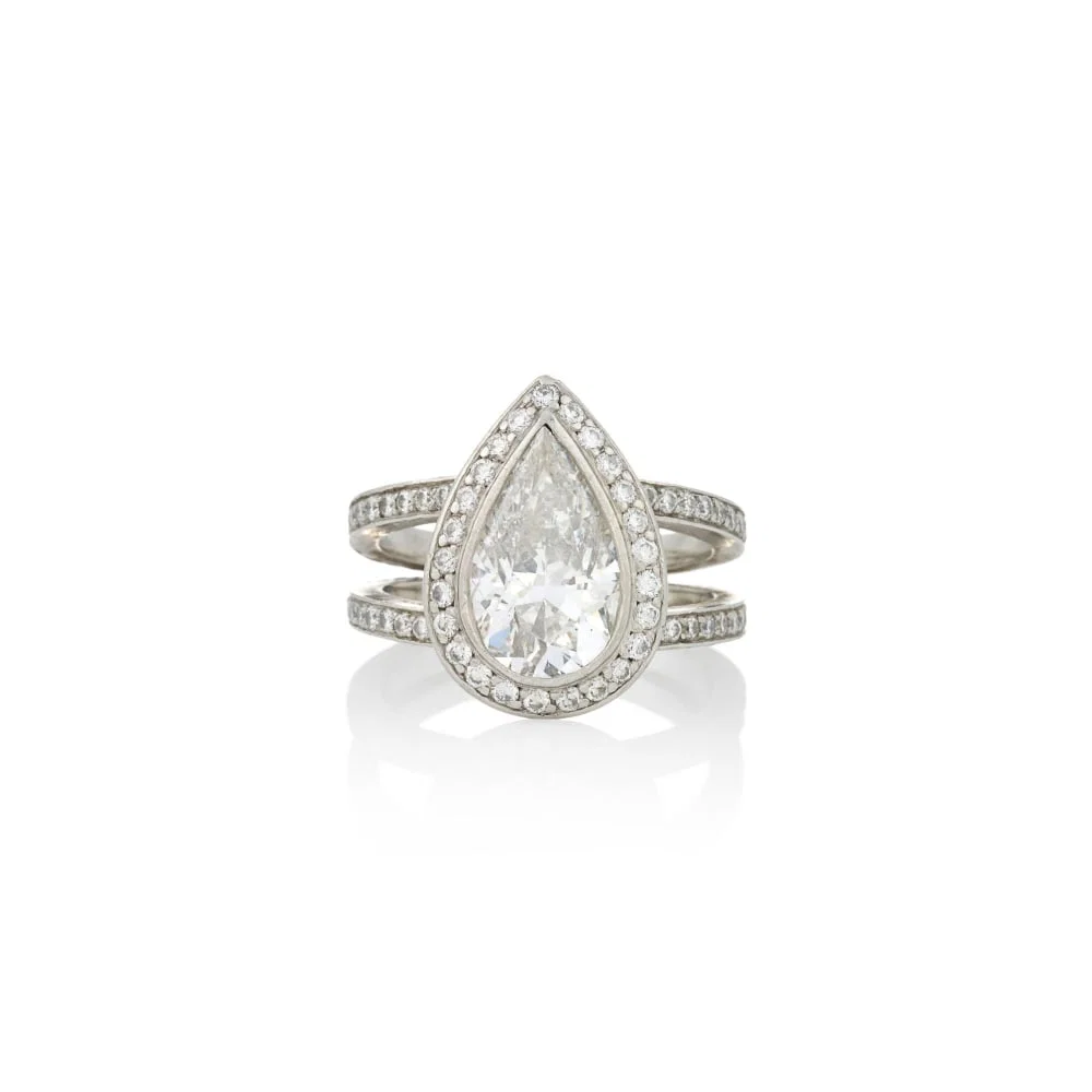 A PLATINUM AND DIAMOND RING