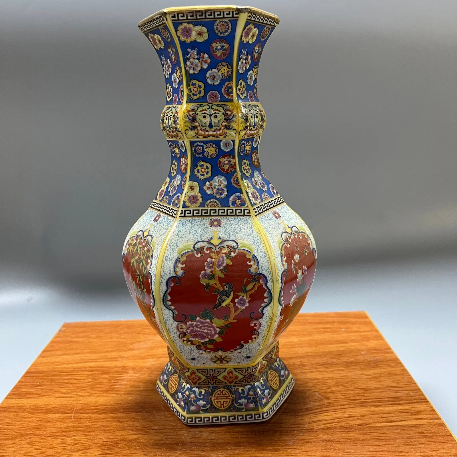 A polychrome hexagonal vase with floral and bird motifs, made by Emperor Yongzheng of the Qing