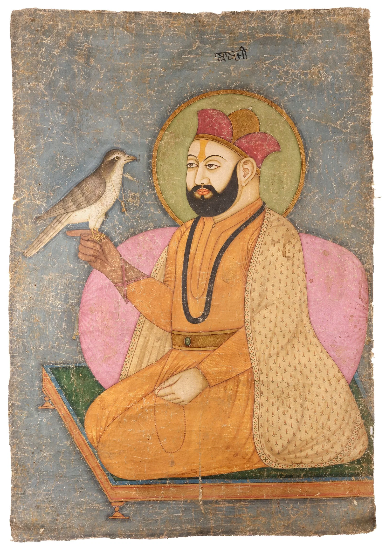 A PORTRAIT OF GURU NANAK DEV JI HOLDING A FALCON, PUNJAB PLAINS, NORTH INDIA, 19TH CENTURY