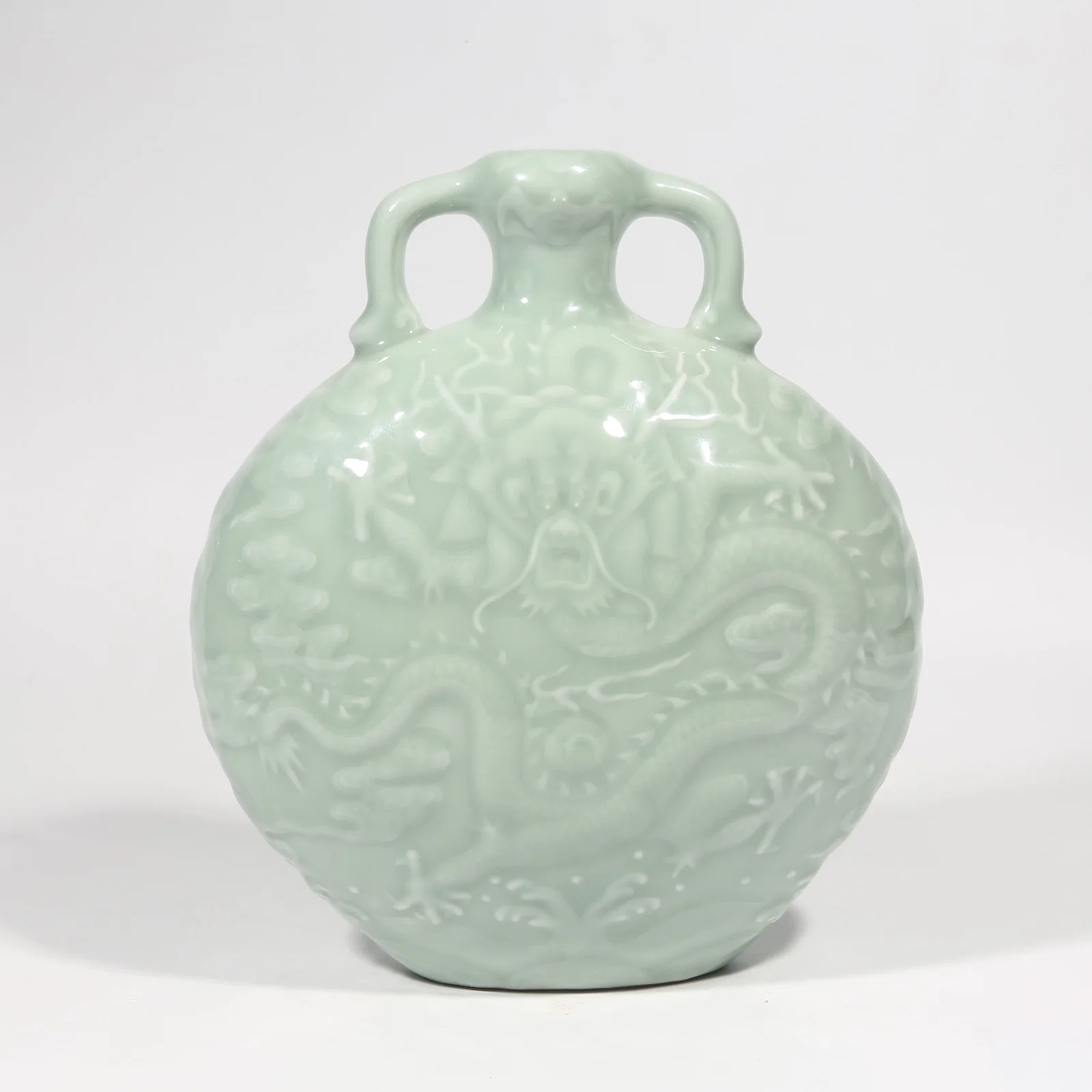 A POWDER BLUE GLAZE CLOUD DRAGON PATTERN FLAT VASE