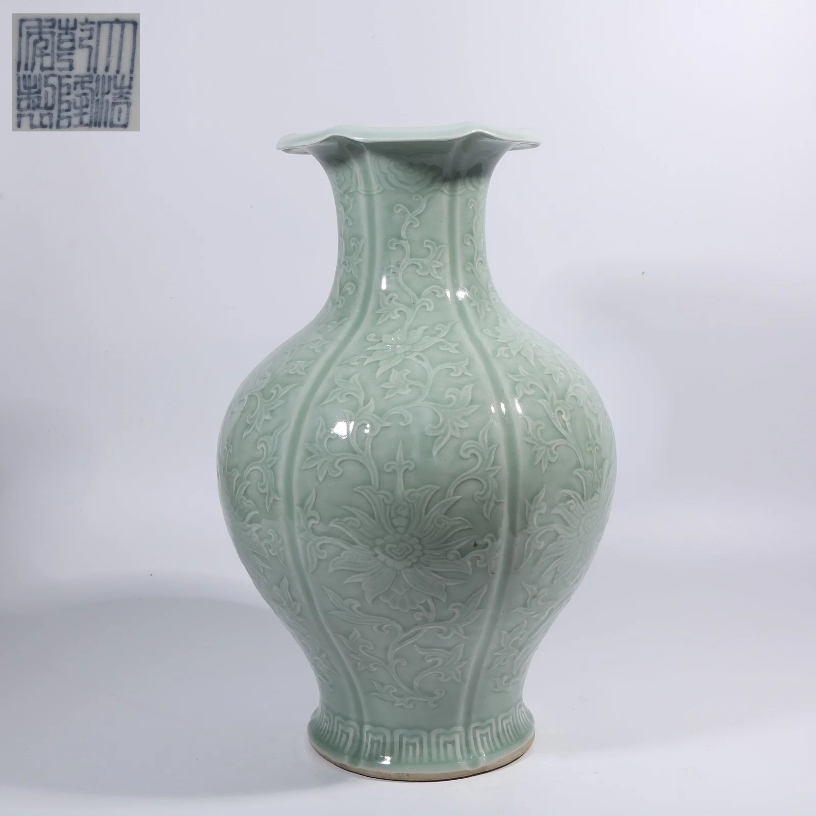 A POWDER-BLUE GLAZE FLOWER-MOUTHED VASE WITH CONTINUOUS FLORAL PATTERN