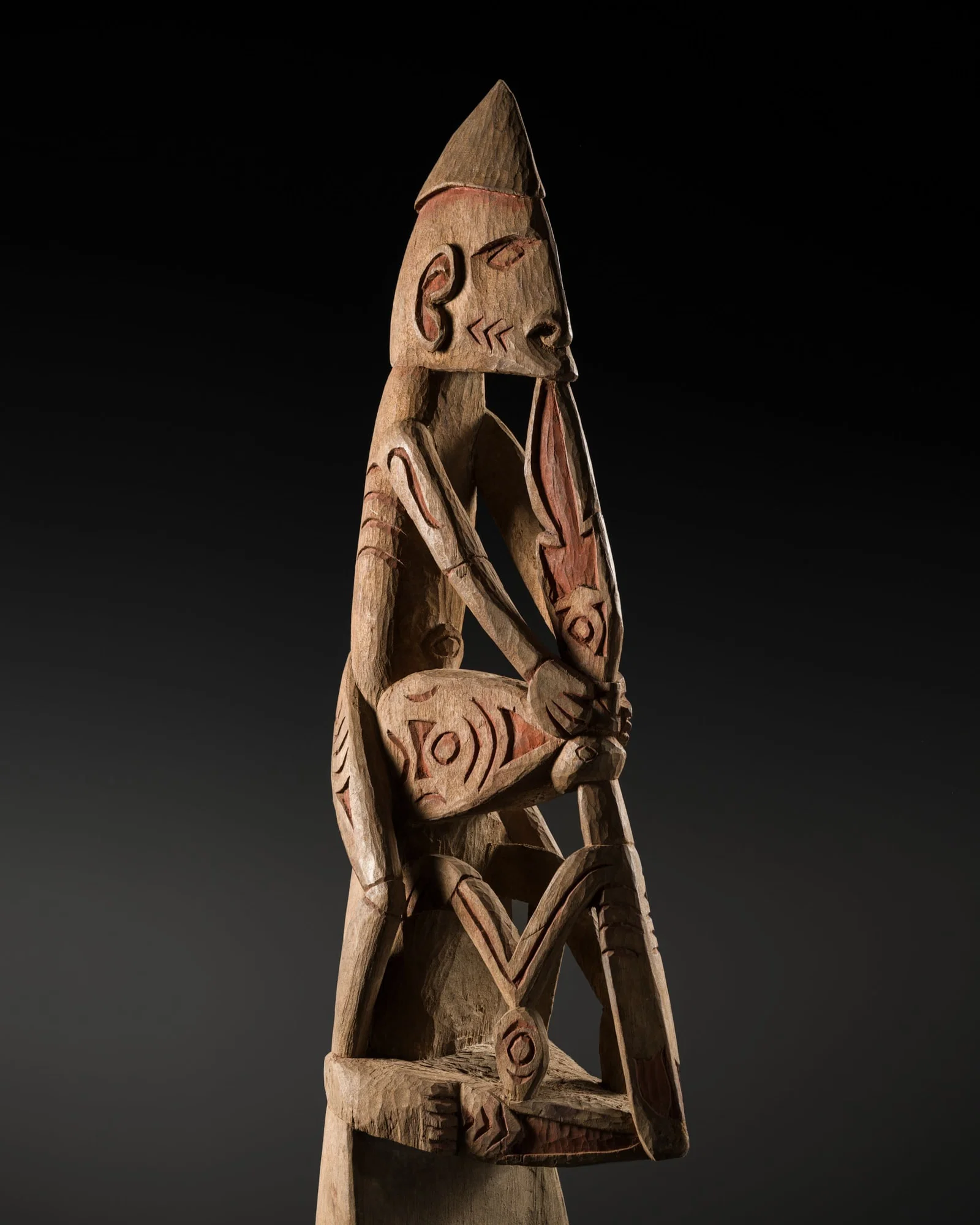 A 'PRAYING MANTIS AND HORNBILL' WOOD CANOE PROW, ASMAT, CASUARINA COAST, 17TH CENTURY