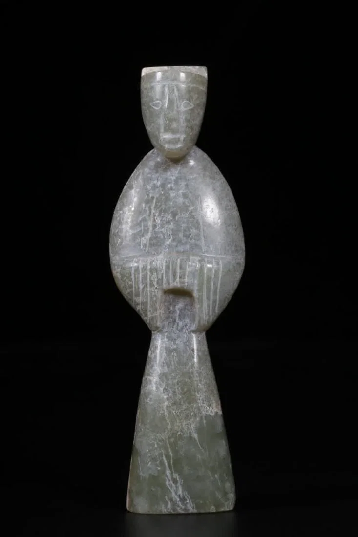 A pre-Ming ancient jade figurine statue