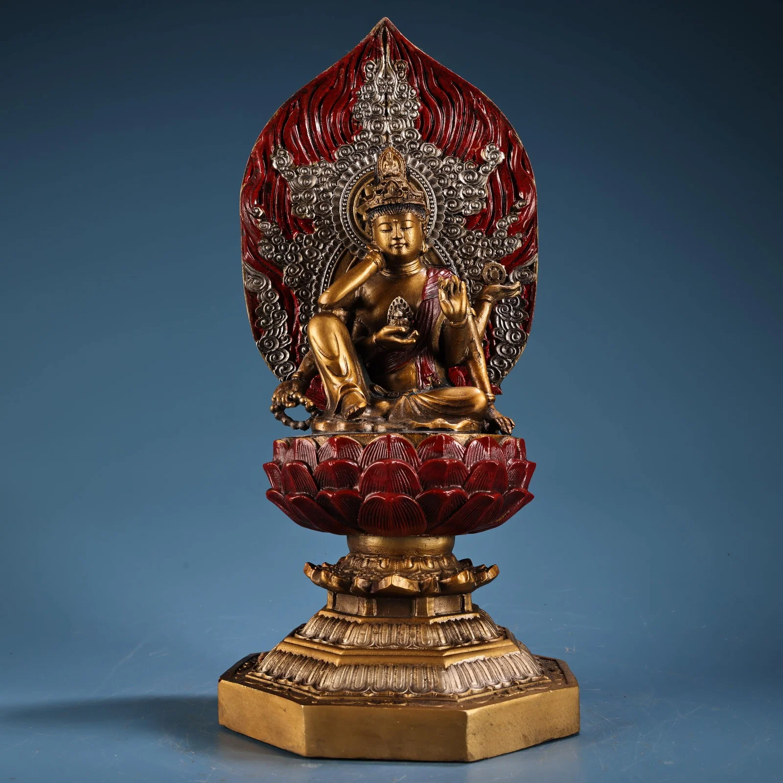 A pure copper, high-relief, painted and gilded six-armed Guanyin Bodhisattva with a wish-fulfilling