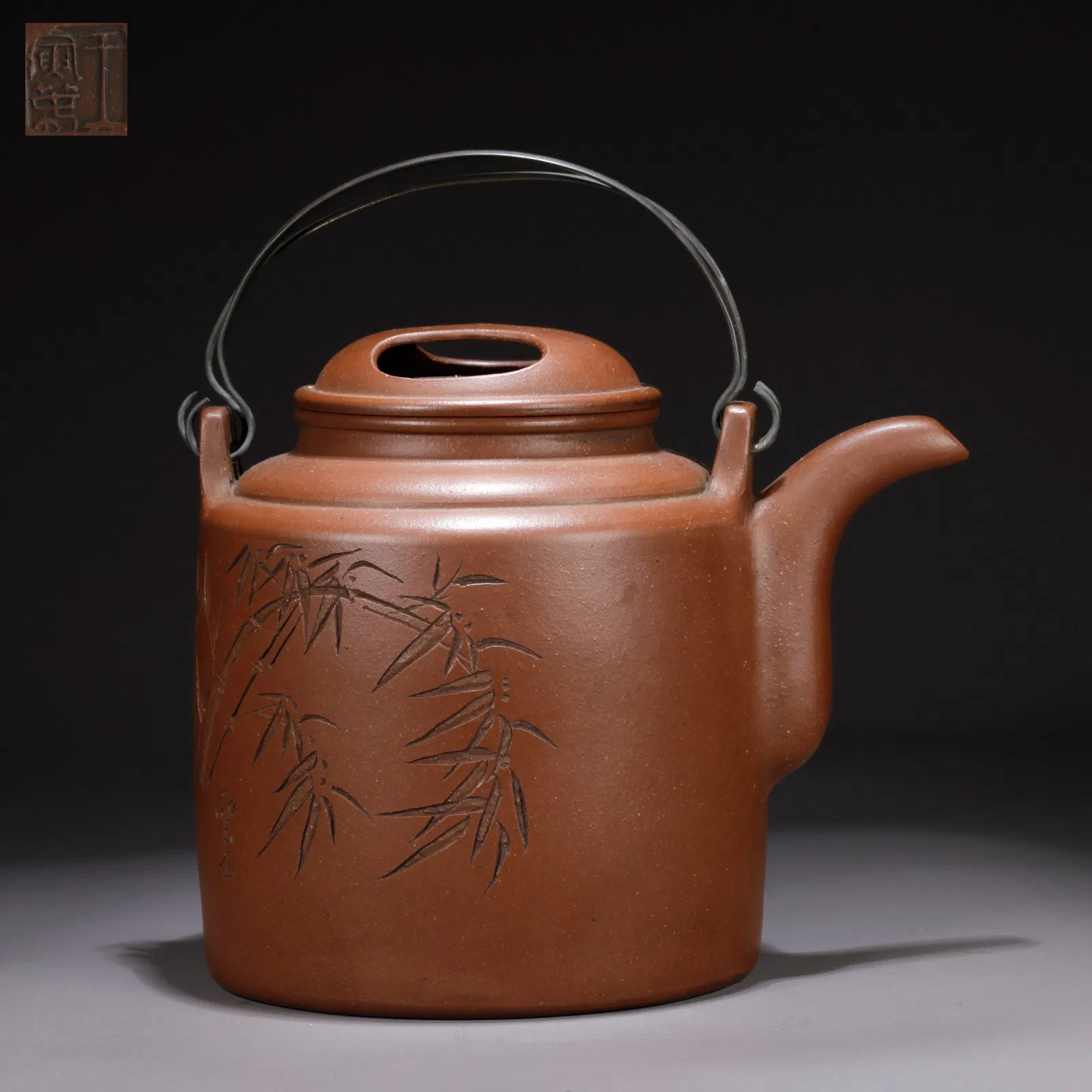 A PURPLE CLAY (ZISHA) TEAPOT WITH INSCRIBED POETRY