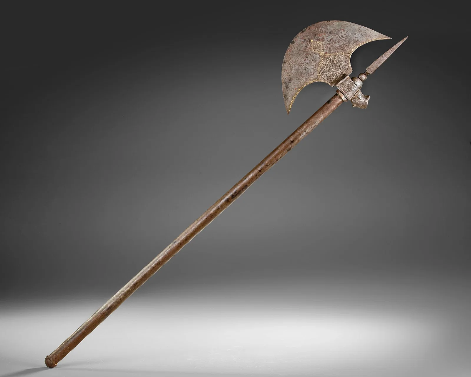 A QAJAR ENGRAVED AXE, PERSIA, 19TH CENTURY