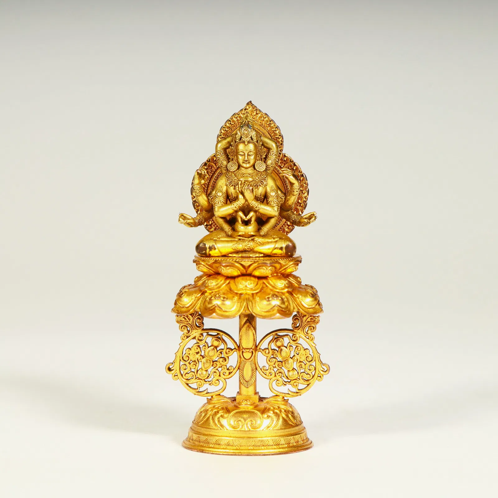 A Qing Dynasty bronze gilt eleven-sided Guanyin statue