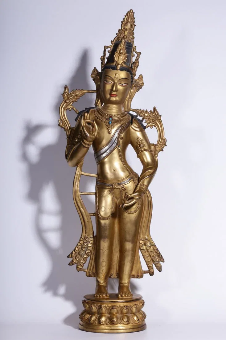 A Qing Dynasty bronze gilt silver lotus Guanyin statue