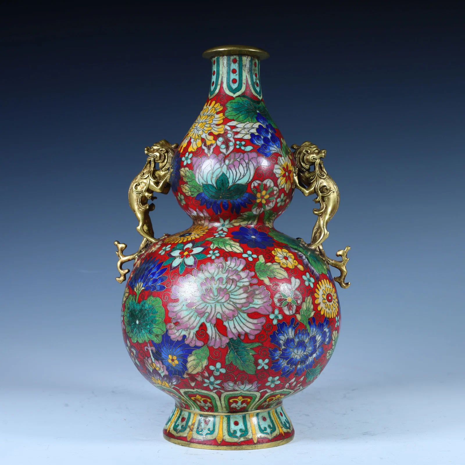 A Qing Dynasty copper-gilt cloisonné enamel gourd bottle