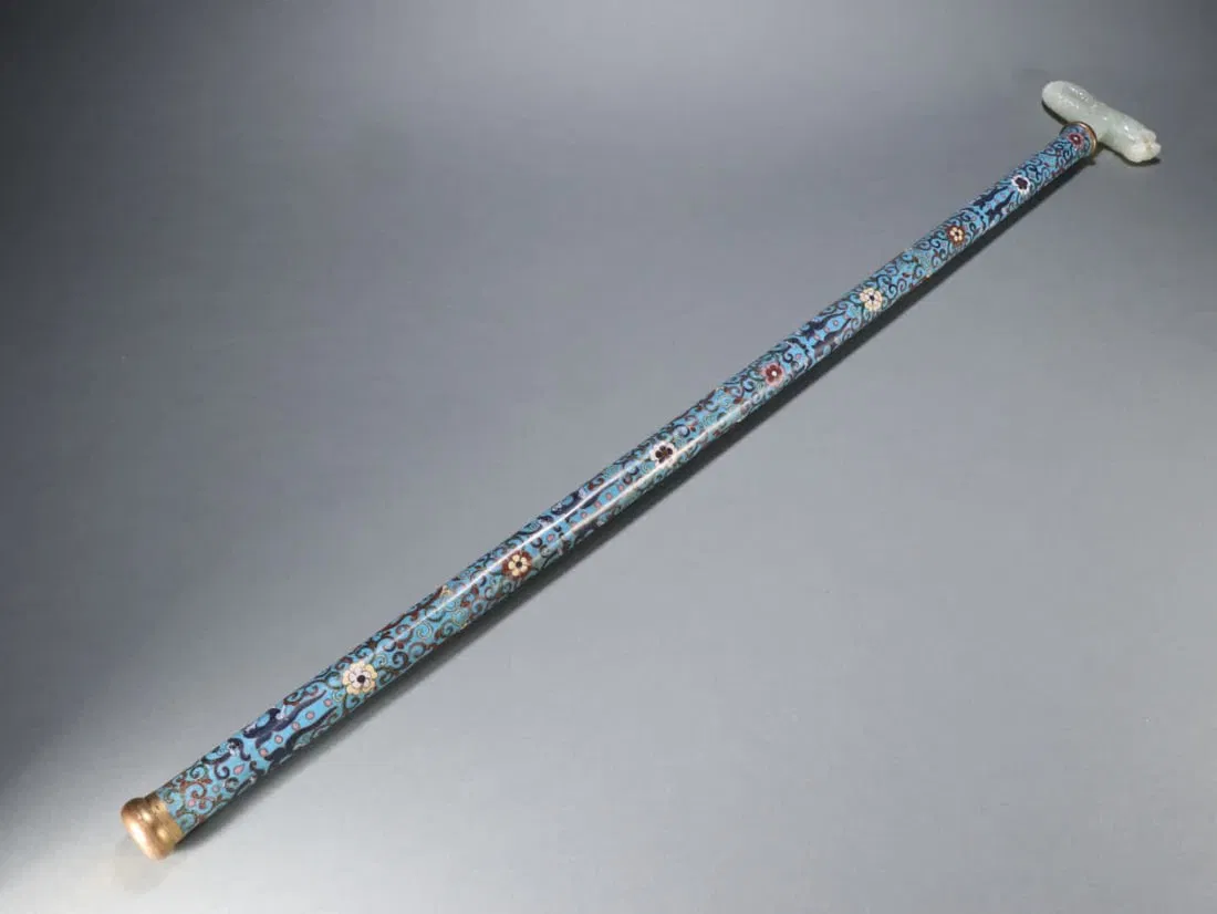 A Qing Dynasty copper gilt cloisonné inlaid jade dragon pattern cane