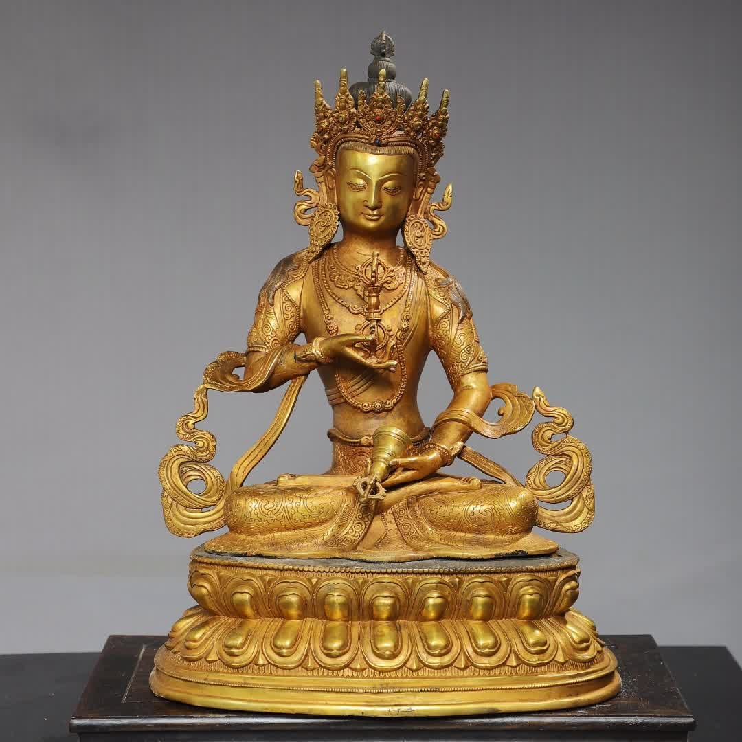 A Qing Dynasty copper gilt split Sattan Vajra Buddha statue