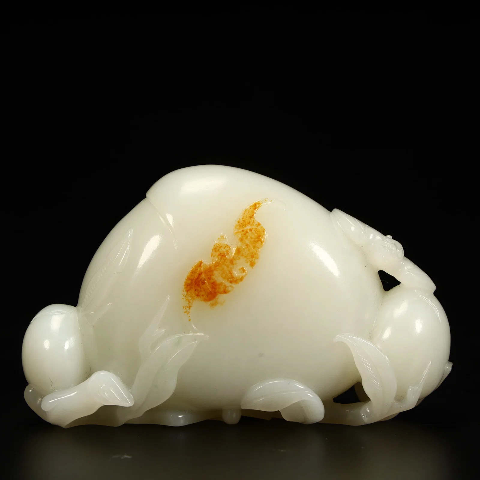 A Qing Dynasty Hetian jade longevity peach ornament