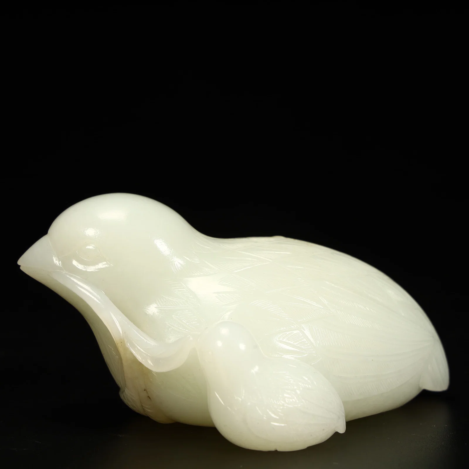 A Qing Dynasty Hetian jade mother quail ornament