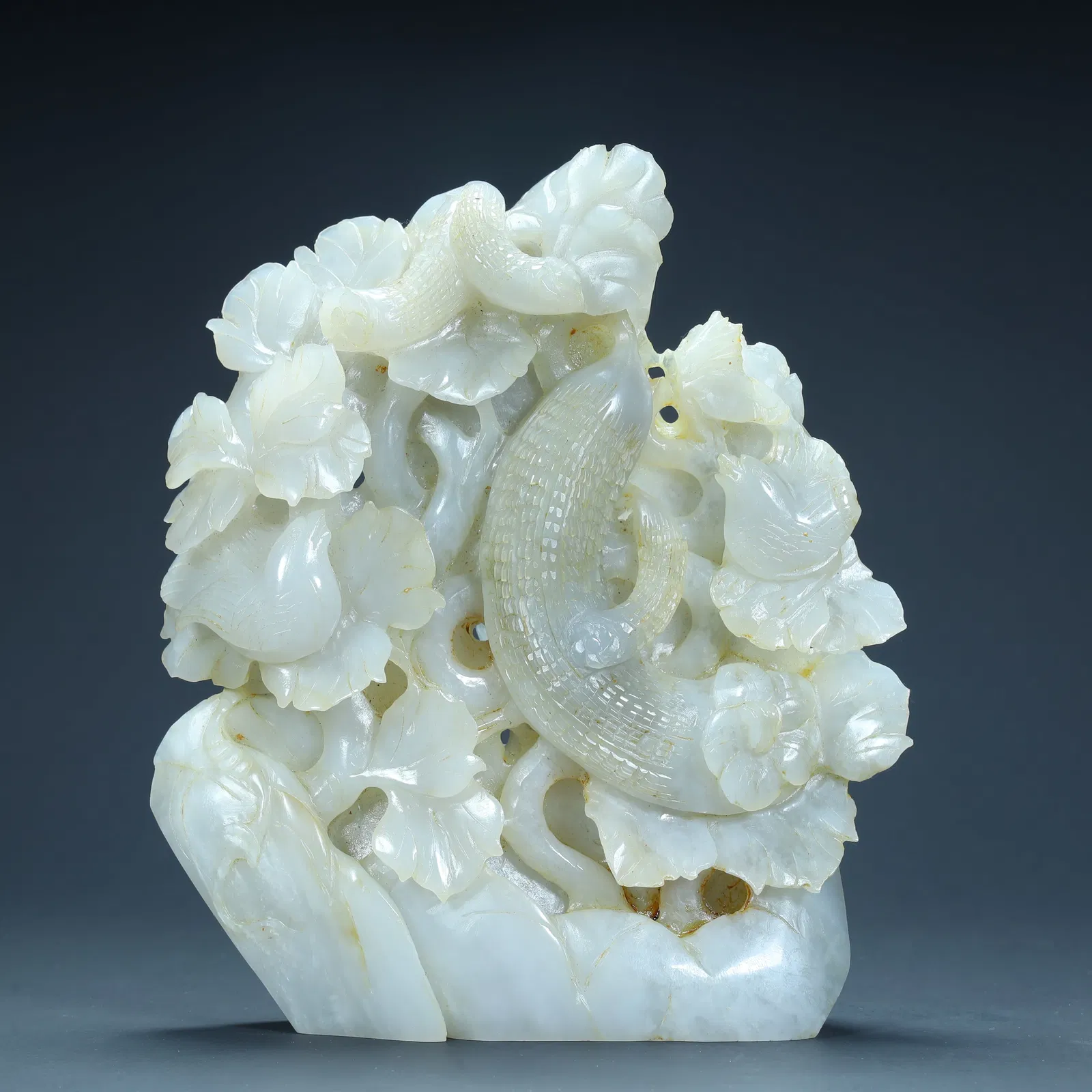 A Qing Dynasty Hetian jade transparent carving "Harvest of Grains" pattern ornament