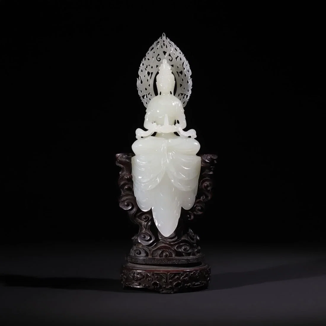 A Qing Dynasty Hetian jade water moon Guanyin seated ornament