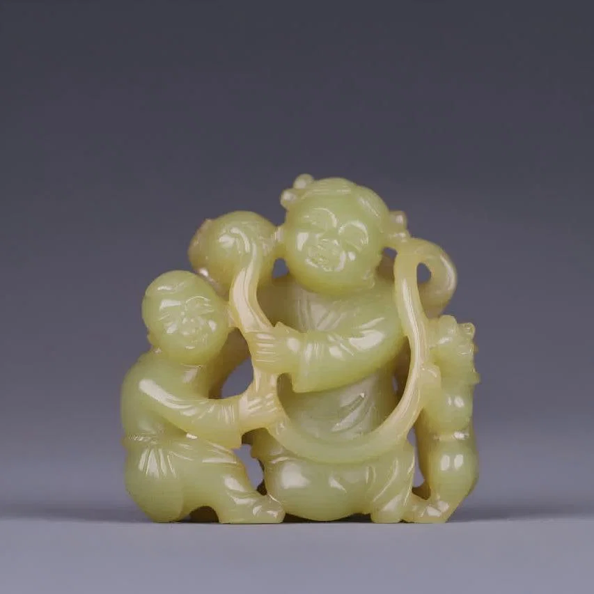 A Qing Dynasty old Hetian topaz boy auspicious beast carving