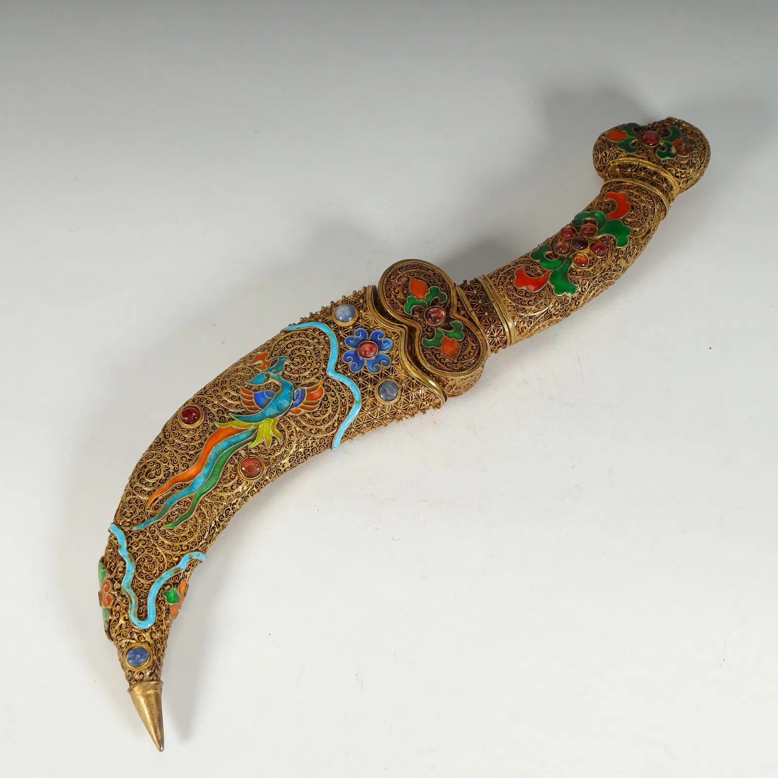 A Qing Dynasty Qianlong period silk inlaid treasure burnt blue phoenix pattern scimitar