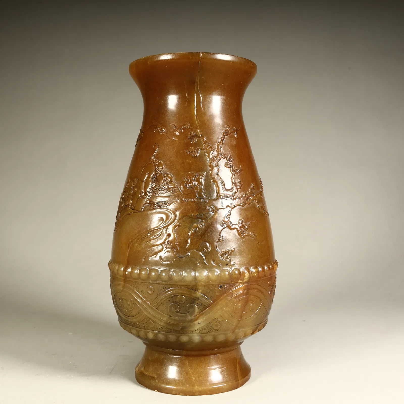 A Qing Dynasty Shoushan stone landscape character pattern bottle