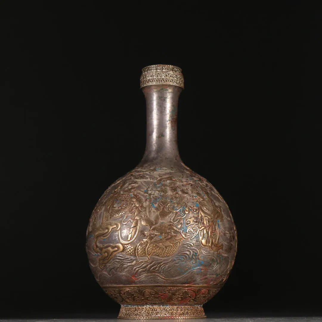 A Qing Dynasty silver-gilt character picture story bottle