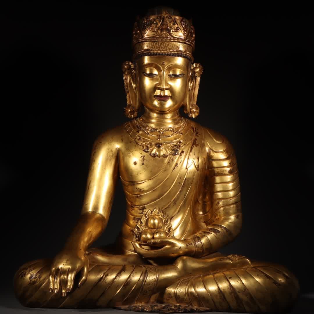 A Qing Dynasty Tibetan bronze gilt Buddha statue