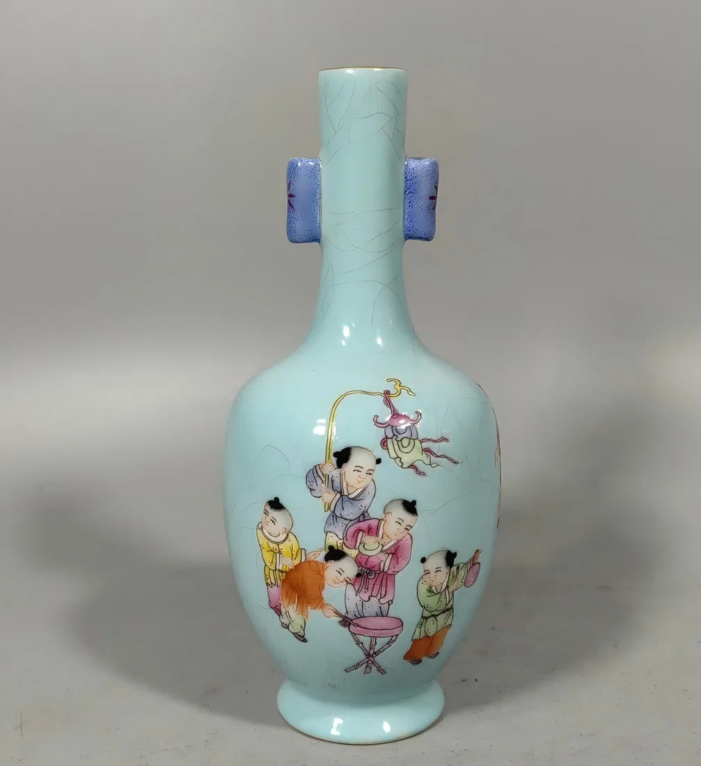 A Qing Dynasty turquoise green baby play vial