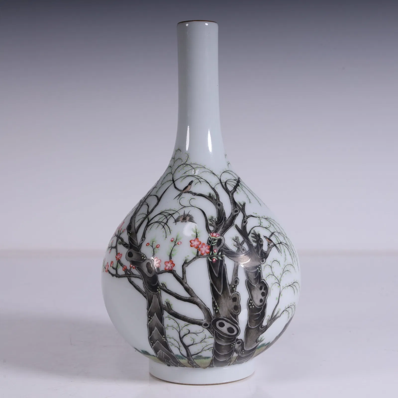 A Qing pastel flower and bird pattern gall bottle