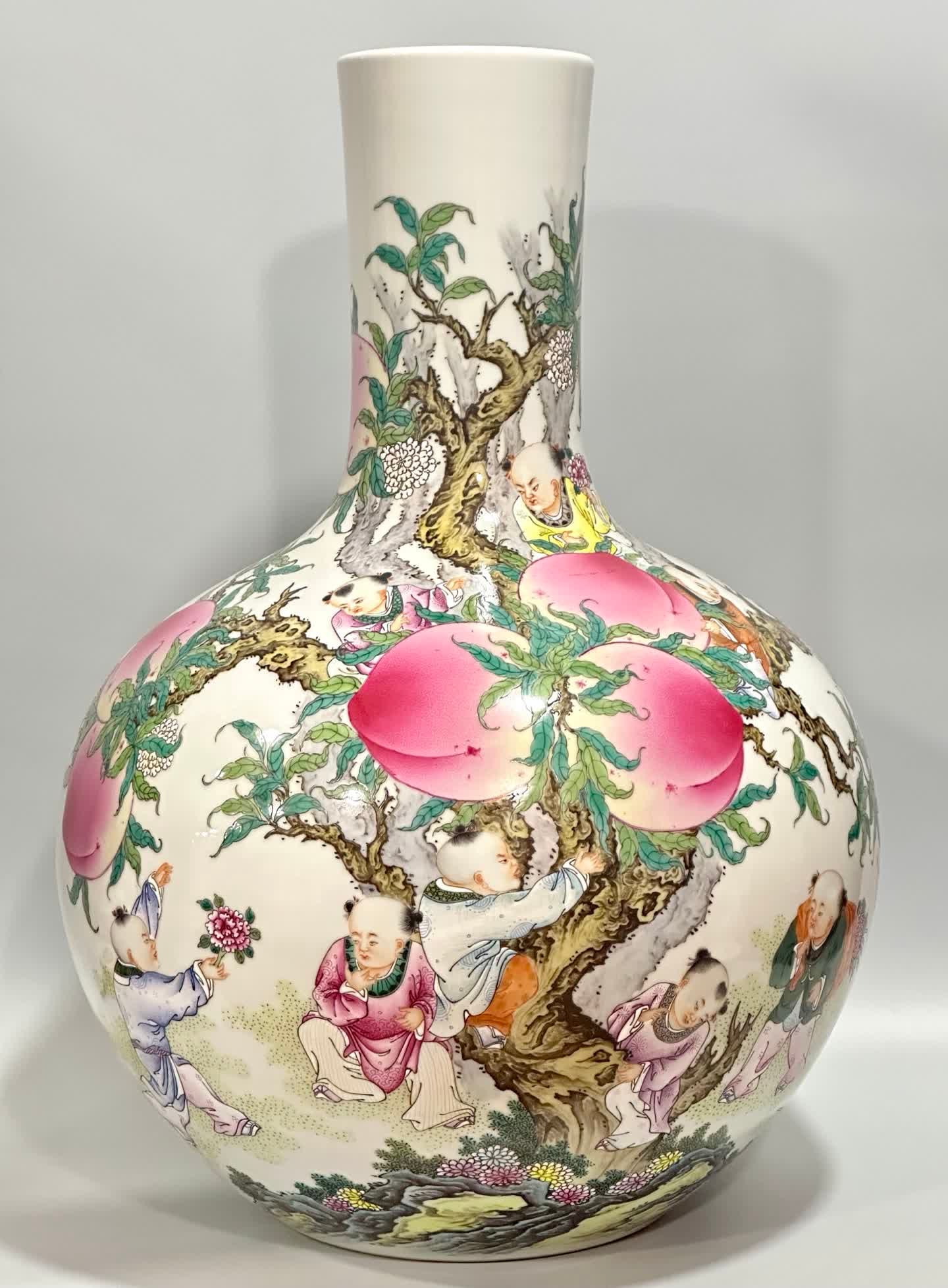 A Qing Qianlong enamel color figure nine sons pan peach picture Tianqiu vase