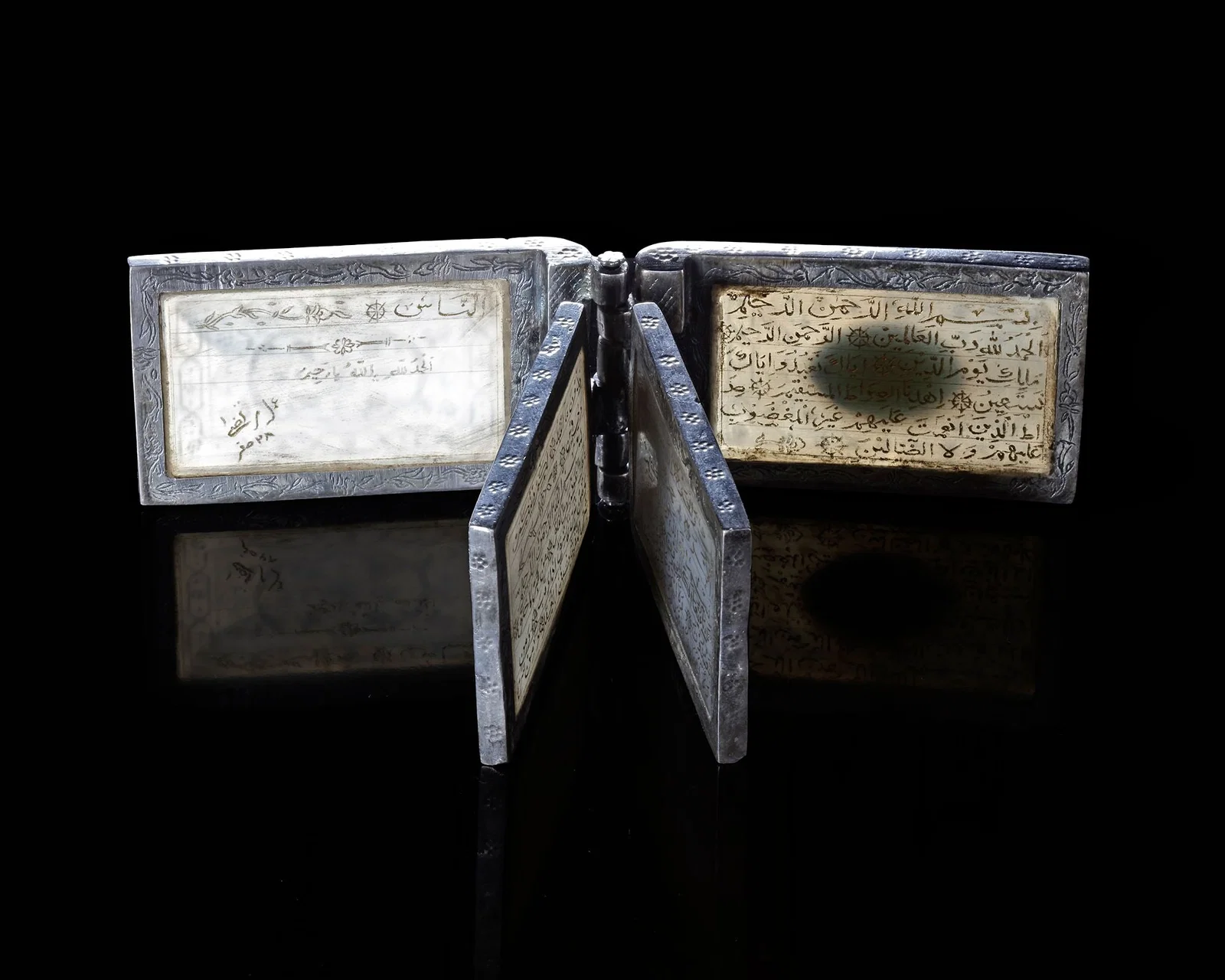 A QURAN JADE AMULET, NORTHERN INDIA, 19TH CENTURY