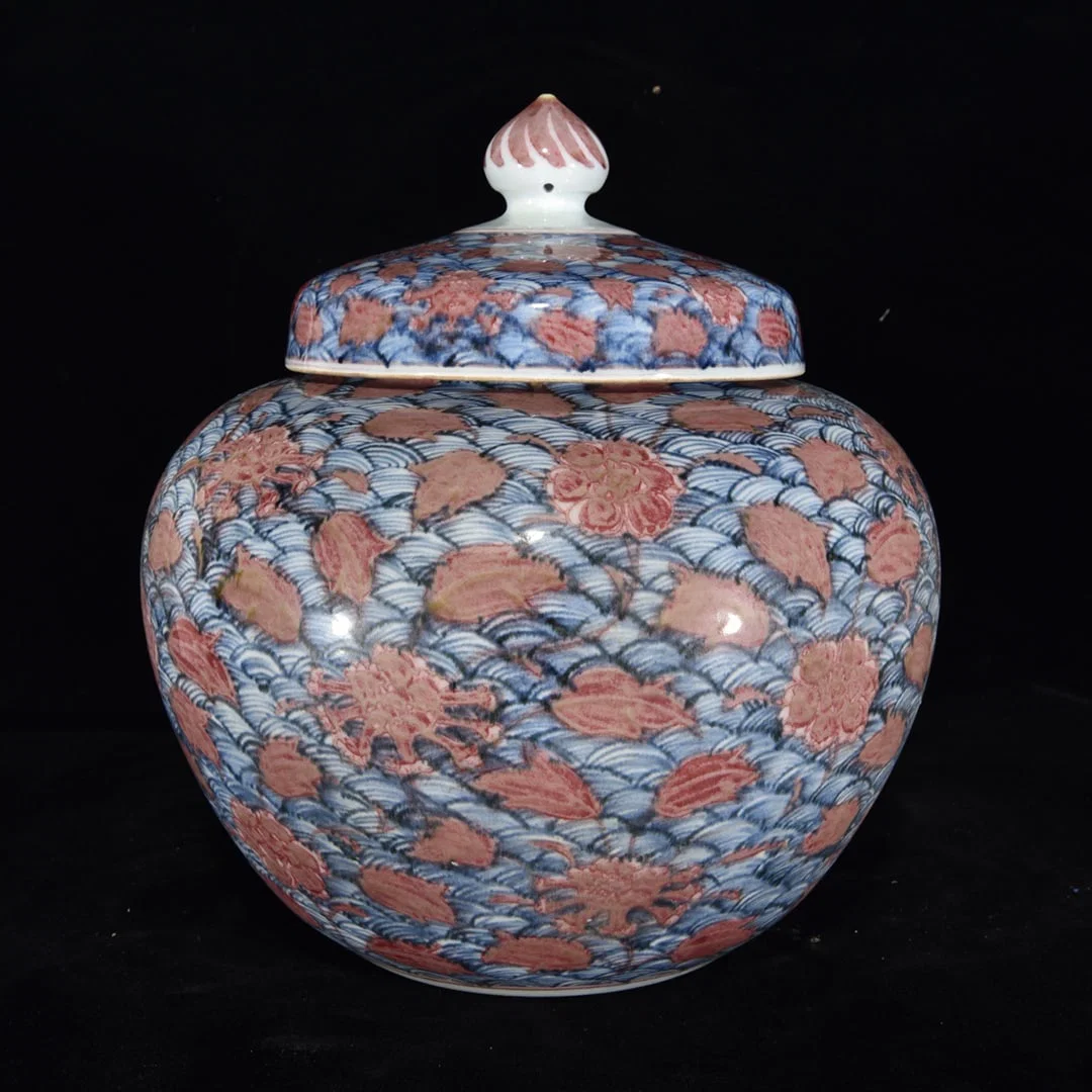 A Rare Blue and White Underglaze-Red Seawater and Flower Pattern Jar with Cover