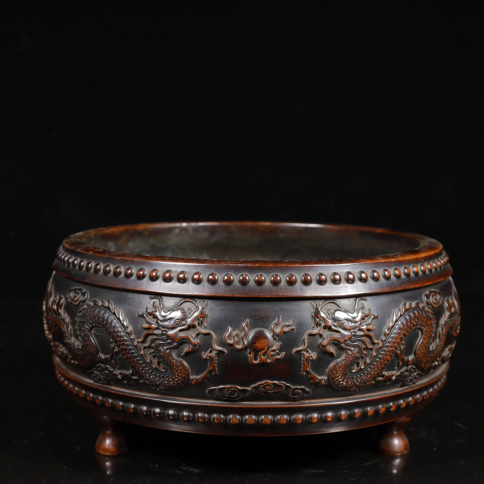 A Rare Bronze Auspicious Cloud and Dragon Pattern Tripod Censer