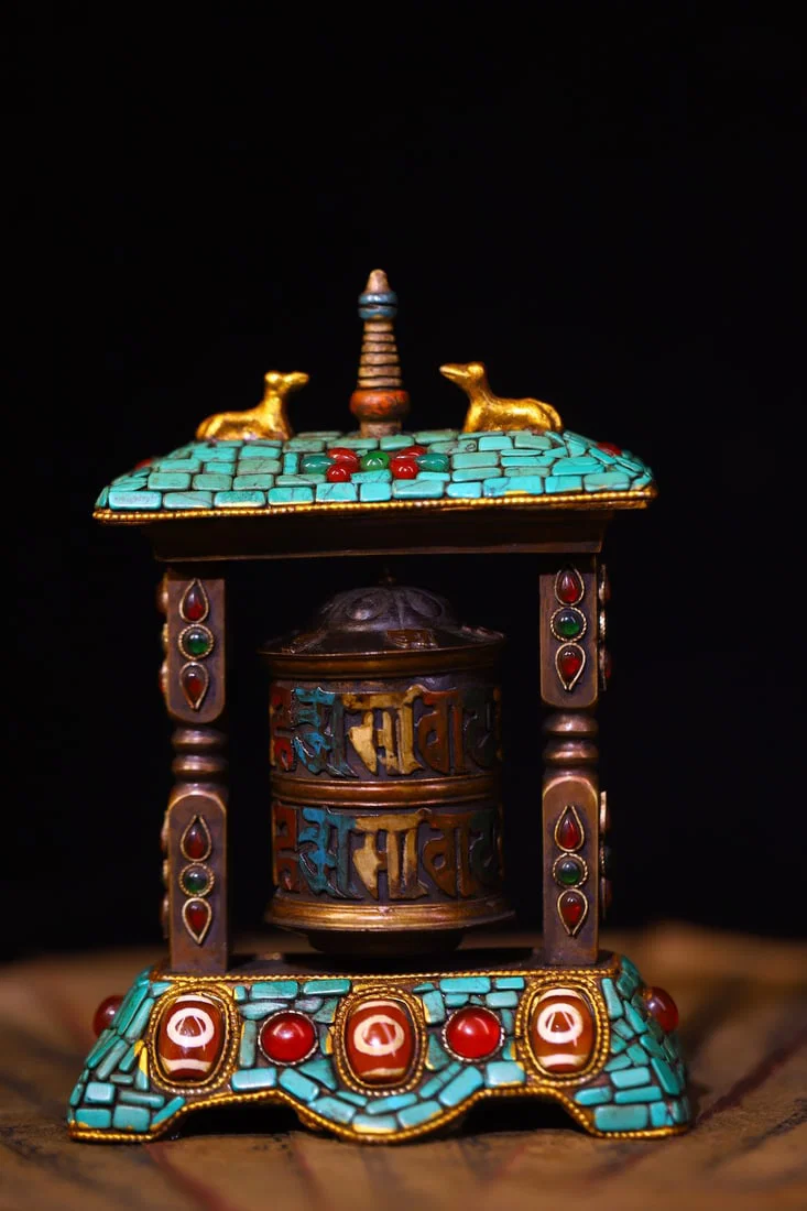 A Rare Bronze Inlaid Dzi Bead and Turquoise Auspicious Beast Ornament