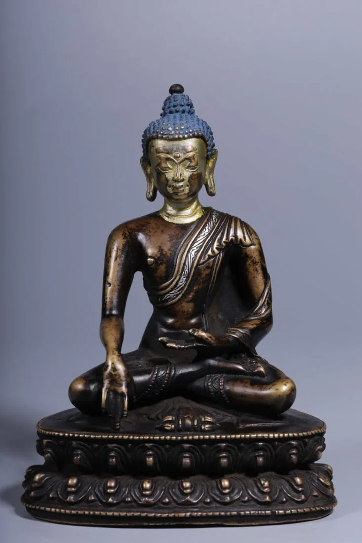 A Rare Bronze Inlaid Silver Statue of Sakyamuni