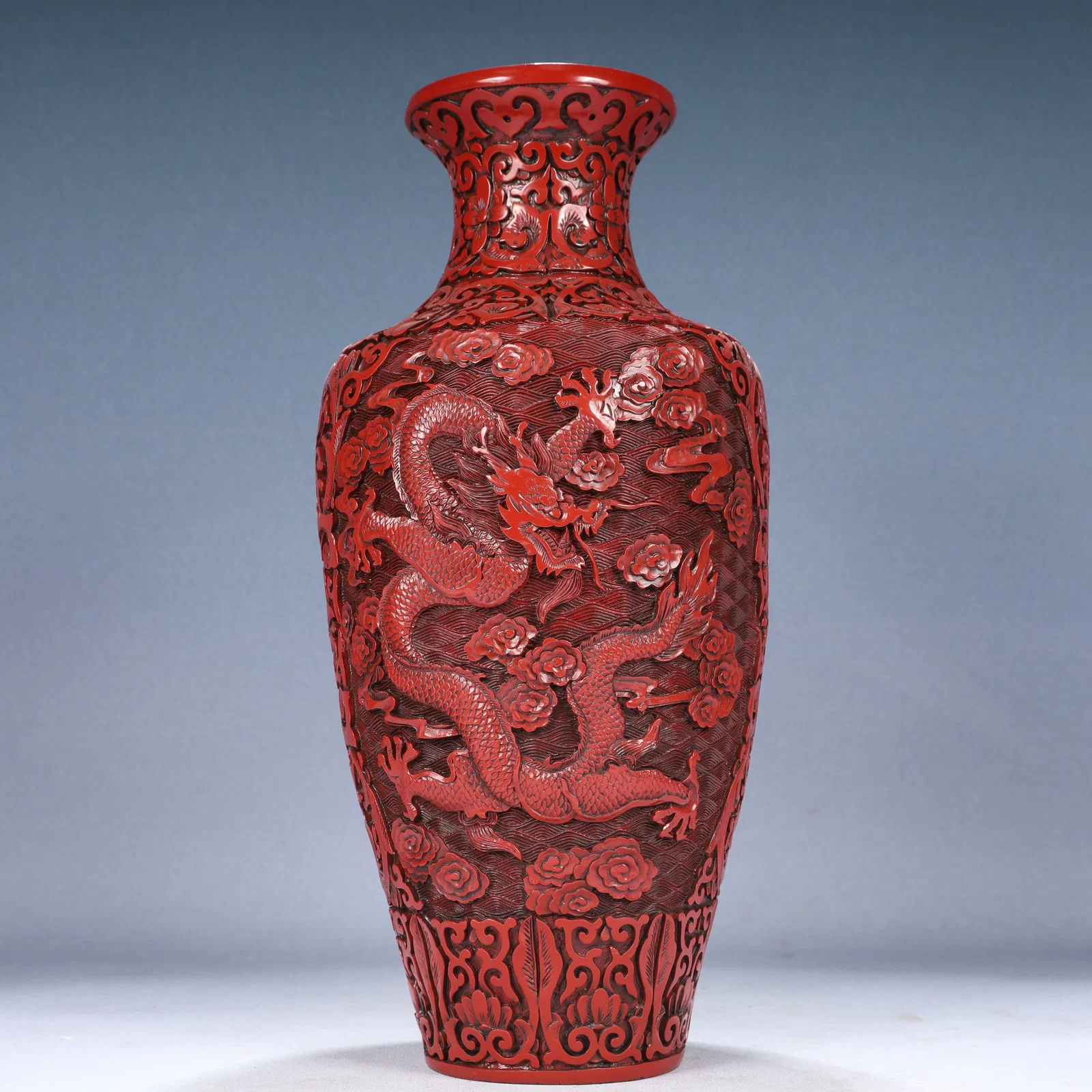 A Rare Carved Red Lacquer Seawater,Auspicious Cloud and Dragon Pattern Vase
