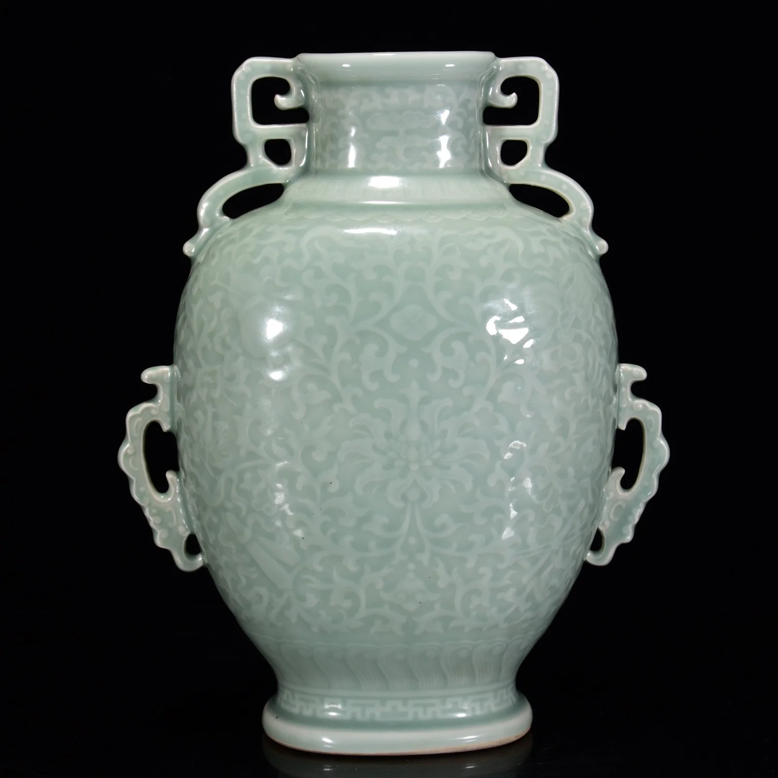 A Rare Celadon Glazed Carved Flower Pattern Double-Ears Vase