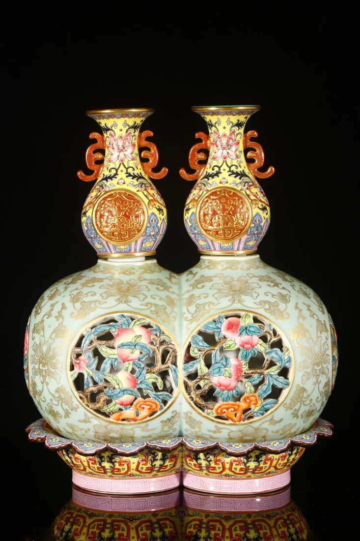A Rare Celadon Glazed Lotus Pattern Conjoined bottles