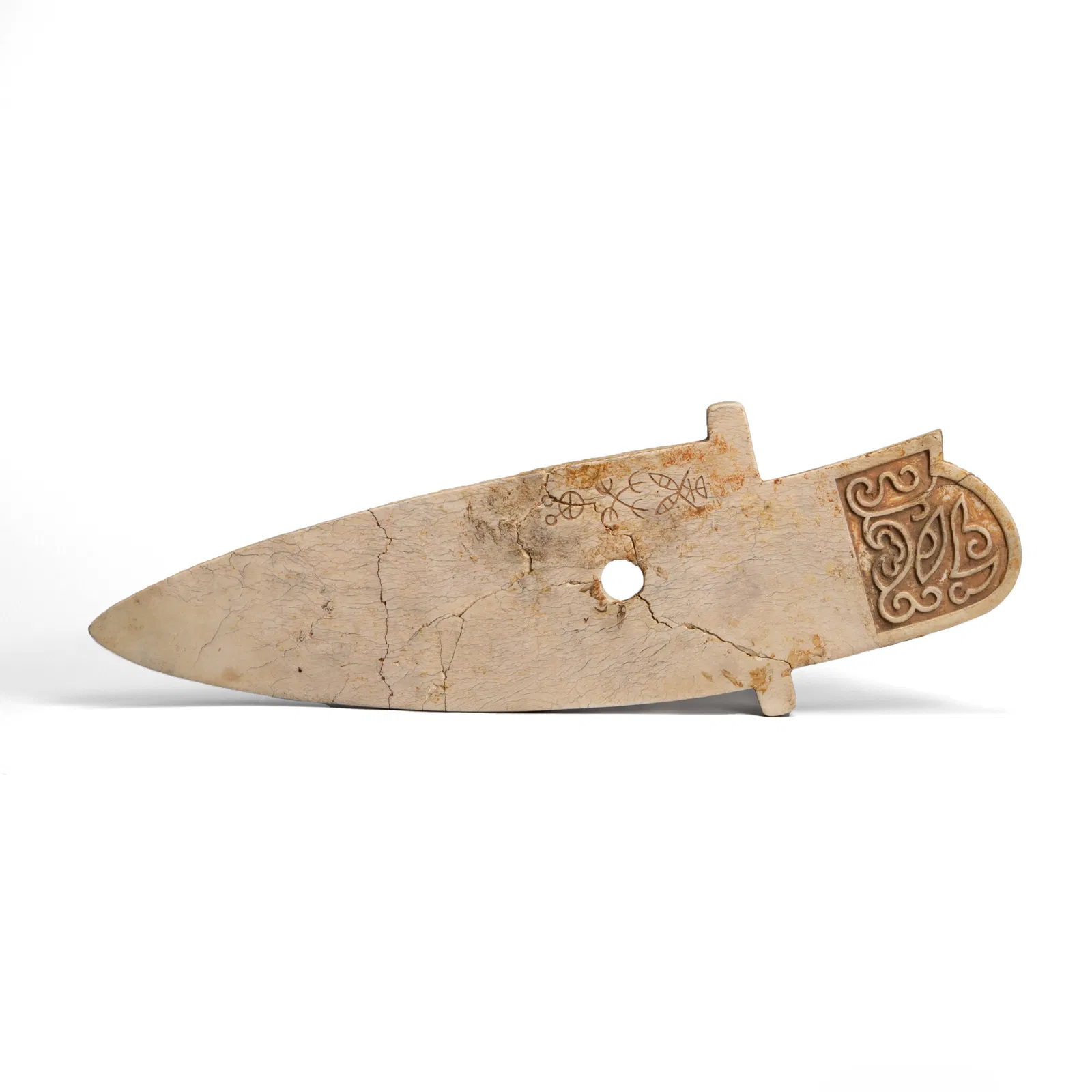 A RARE CHINESE REWORKED 'CHICKEN BONE' JADE CEREMONIAL BLADE, GE, WITH INSCRIPTION, SHANG DYNASTY (C