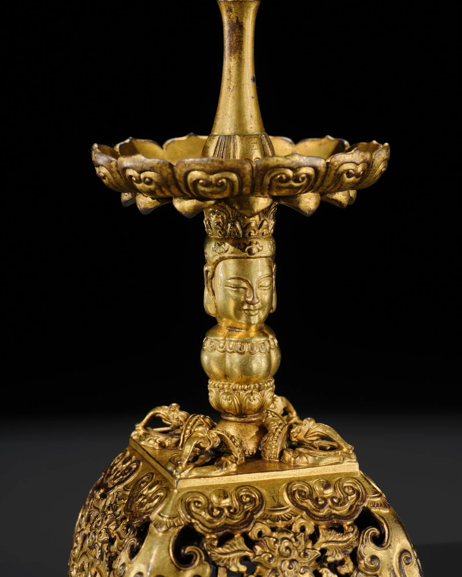 A RARE GILT-BRONZE BUDDHIST ALTAR PRICKET CANDLESTICK, ZHUTAI, 15TH CENTURY